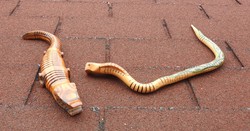 Wooden movable cobra and crocodile