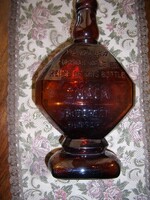 An interestingly shaped zwack liqueur bottle from the beginning of the last century