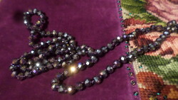 110 Cm, smoky purple, faceted crystal pearl necklace, knotted in each eye.