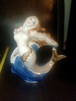 Porcelain mermaid.