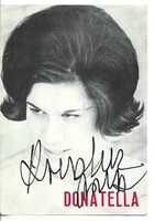 Autograph of Italian singer Donatella Moretti on autograph, dedicated, handwritten signature on a photo page.