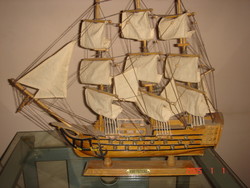 A three-masted sailing ship