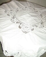 Wonderful ribbon embroidered on special snow-white lace tablecloth