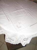 White embroidered azure tablecloth with a beautiful hand crocheted edge