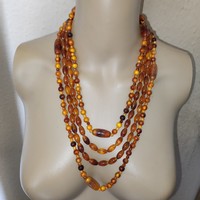 2 necklaces with an amber effect without a switch