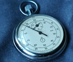 Seconds and hundredths of minutes mechanical stopwatch in one