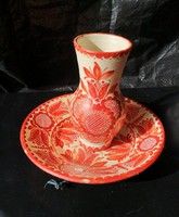 Red and white folk ceramic goblet and plate