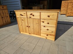 Three-door, three-drawer pine dresser in good condition for sale.
