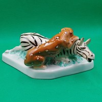 Hunting scene, leopard and zebra porcelain figure