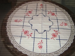 Cute hand-embroidered placemat with pink lace edge