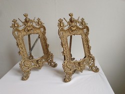 Two antique old cast iron table decorative picture frames with a pair of supports, angelic and complete