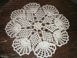 Beautiful white hand-crocheted round lace tablecloth