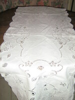 Beautiful snow-white sewn madeira lace tablecloth