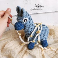 Léna, the crocheted Christmas llama