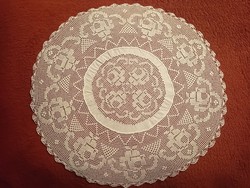 Old pink, round lace tablecloth