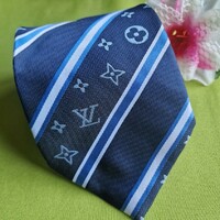 Wedding nyk59 - striped and floral patterned silk tie on a dark blue background