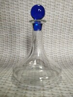 Decorative glass with blue crystal plug