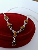 Silver necklace with blue tiger eye stones