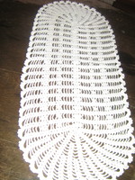 Cute hand crocheted oval white tablecloth