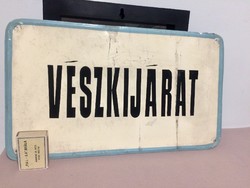 Old aluminum sign with the inscription 
