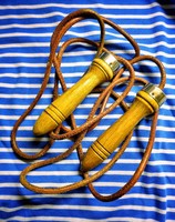 Vintage style skipping rope with wooden handle and leather rope
