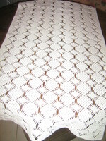 Beautiful handmade crocheted snow-white tablecloth