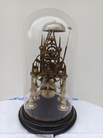 Antique skeleton clock, external pendulum, winding spindle. 1900
