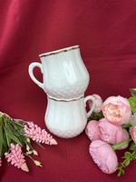 Zsolnay's pot-bellied white mug, a bunch of mugs, is a legacy of Grandma Finjsa's treasure