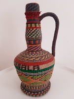 Old woven glass bottle, boutique