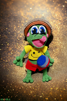 Hand-crocheted beach frog with amigurumi technique