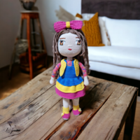 Dress-up doll hand-crocheted using the amigurumi technique