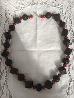 Old beautiful lava stone necklace with red glass inserts for sale!