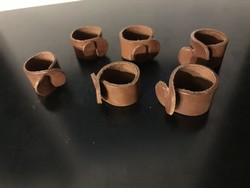 6 leather napkin rings (20/c)