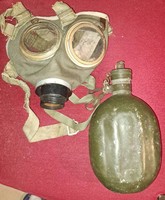 Military equipment, gas mask, water bottle.