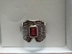 A special silver ring with a garnet stone