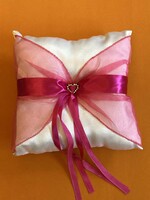 Ring pillow with cyclamen colored organza.