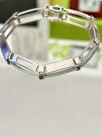 Showy silver bracelet with a clean shape