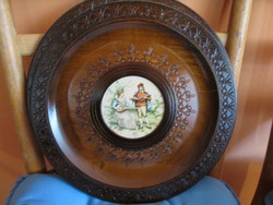 Wooden plates with a romantic scene