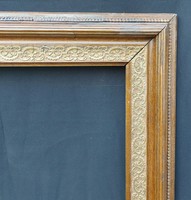 Antique wooden frame with detailed blondel decoration. 65.5X81