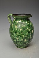 A very nice bell jug with brushed speckling.