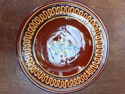 Glazed ceramic wall plate