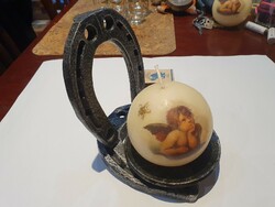 Retro heavy candle holder made of horseshoes with fairy candle