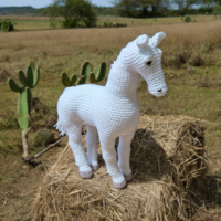 Lifelike horse crocheted by hand using the amigurumi technique