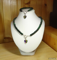 Necklaces made of special green beautiful shiny glass beads with swarovski crystal pendants are now fashionable