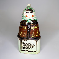 Ceramic bottle, female figure