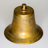 Copper ship's bell with the inscription '1907 grand castle'