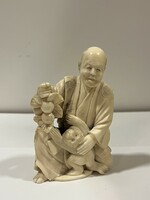 A small statue carved from bone