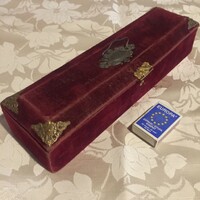 Old glove box covered with antique velvet, decorated with stripes, glove holder