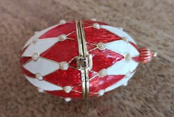 Red and white enameled openable metal egg