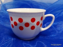 Retro polka dot porcelain mug.